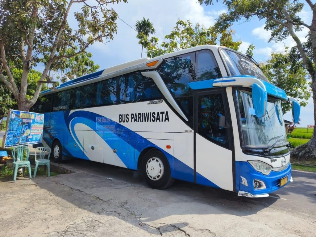 sewa bus pariwisata kualanamu